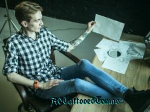 A0TattooedTomas